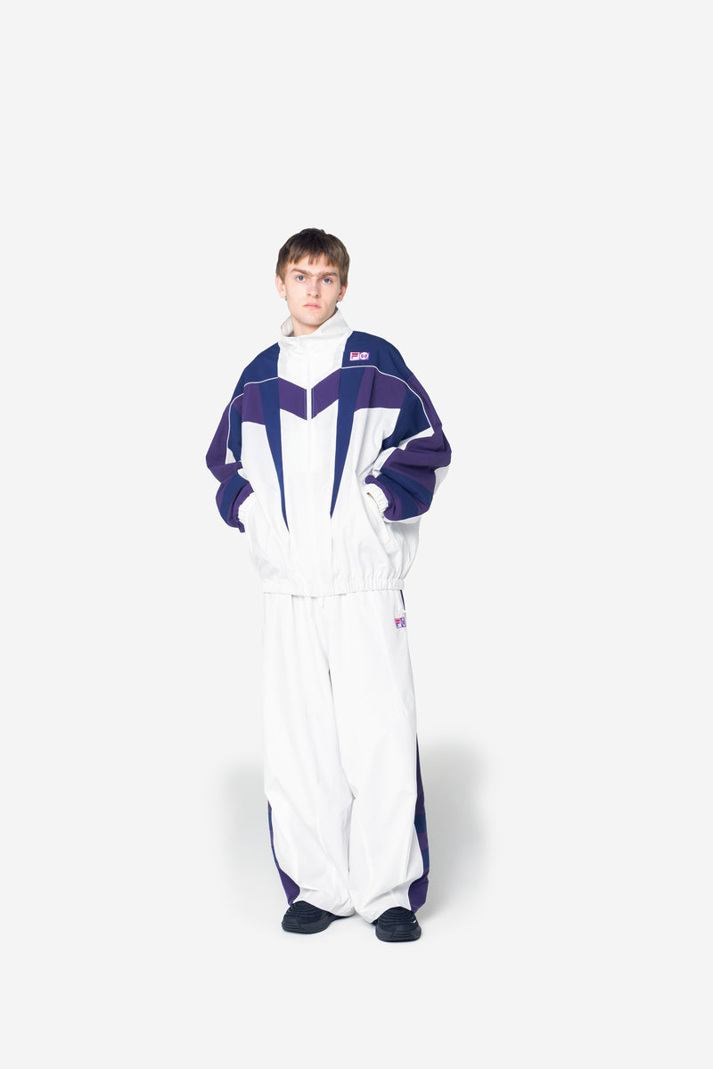 [FILA X 니들스] 스타컷 오버핏 바람막이