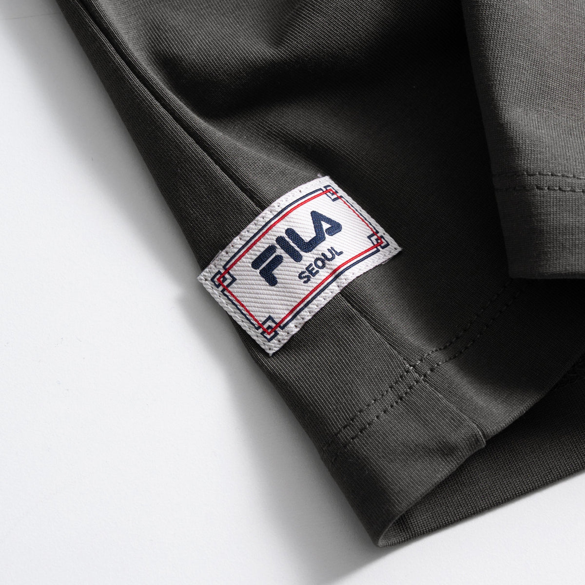 밑단 라벨 포인트 디테일